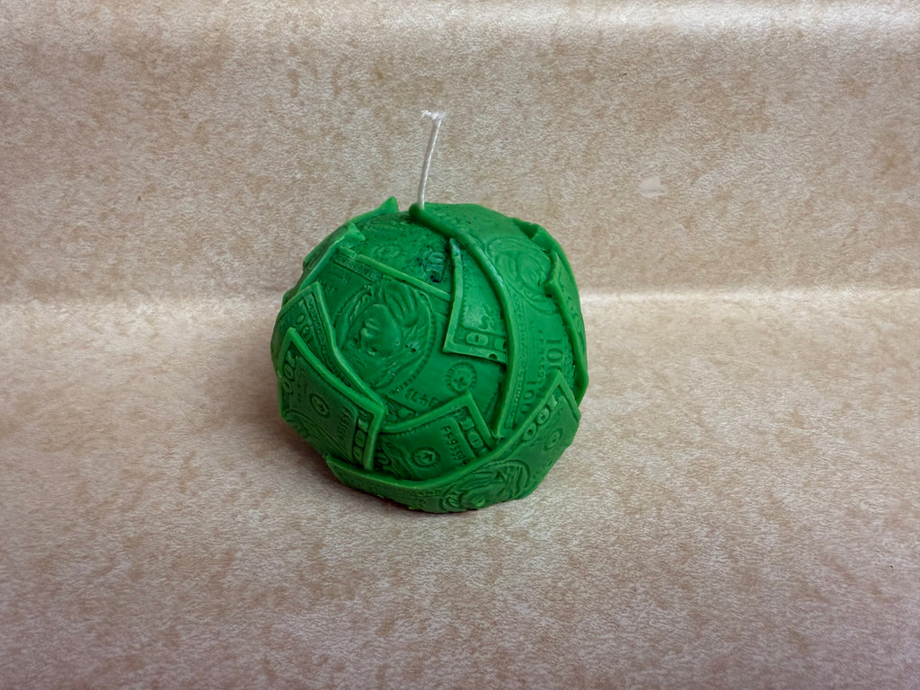 Ball of cash molded candle