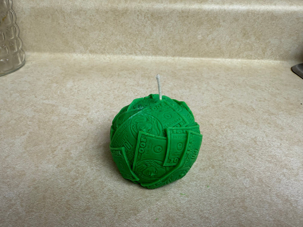Ball of cash molded candle