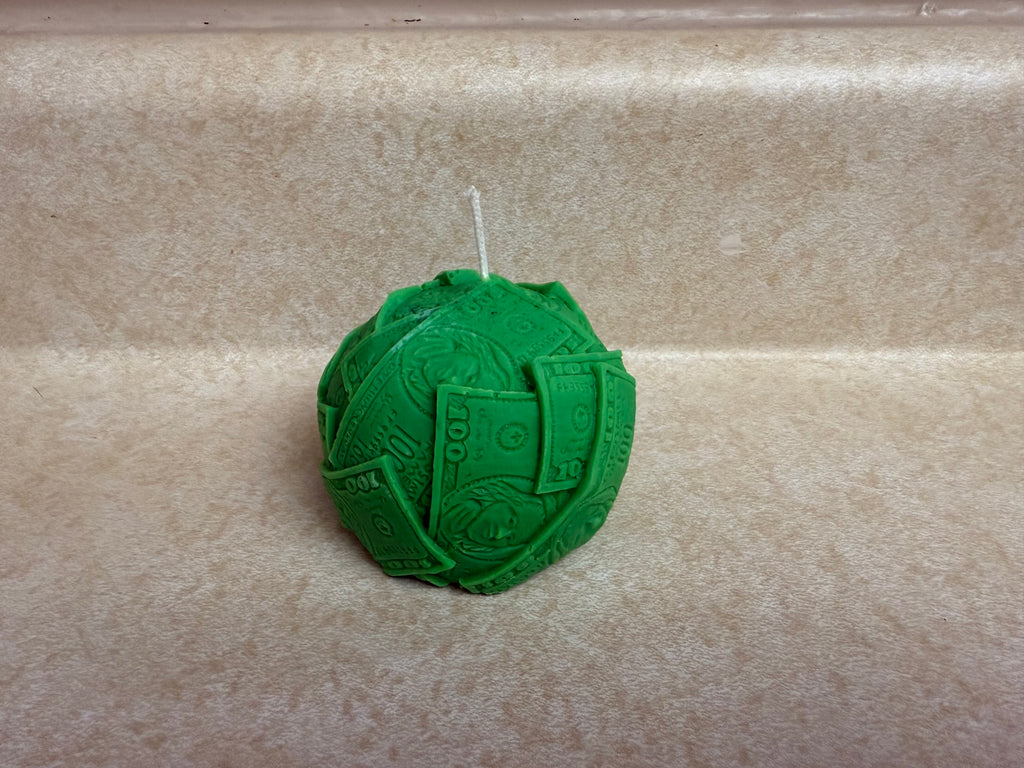 Ball of cash molded candle